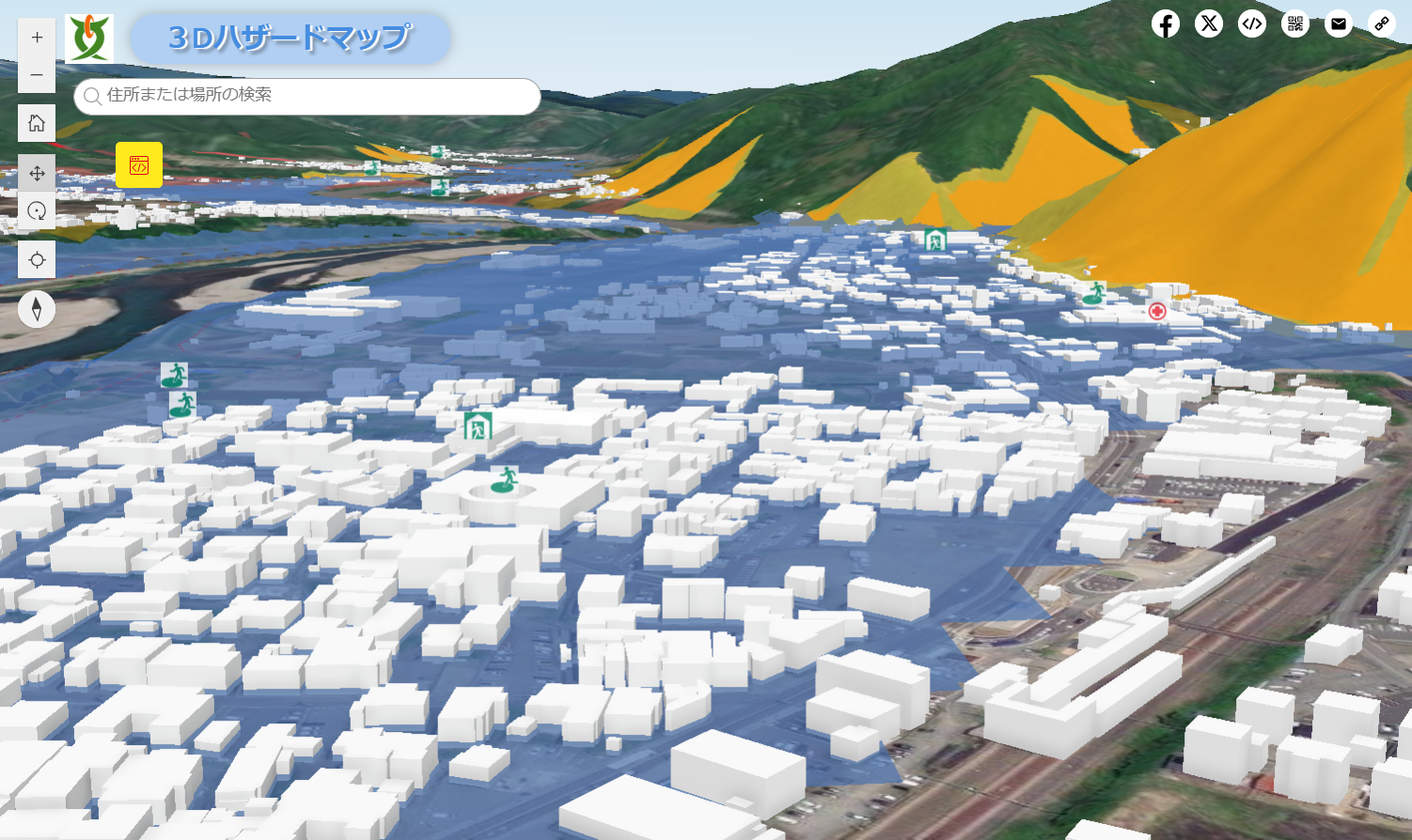 ３Dで表示された建物と防災情報が重なって表示されている明科駅周辺の３Dハザードマップの写真
